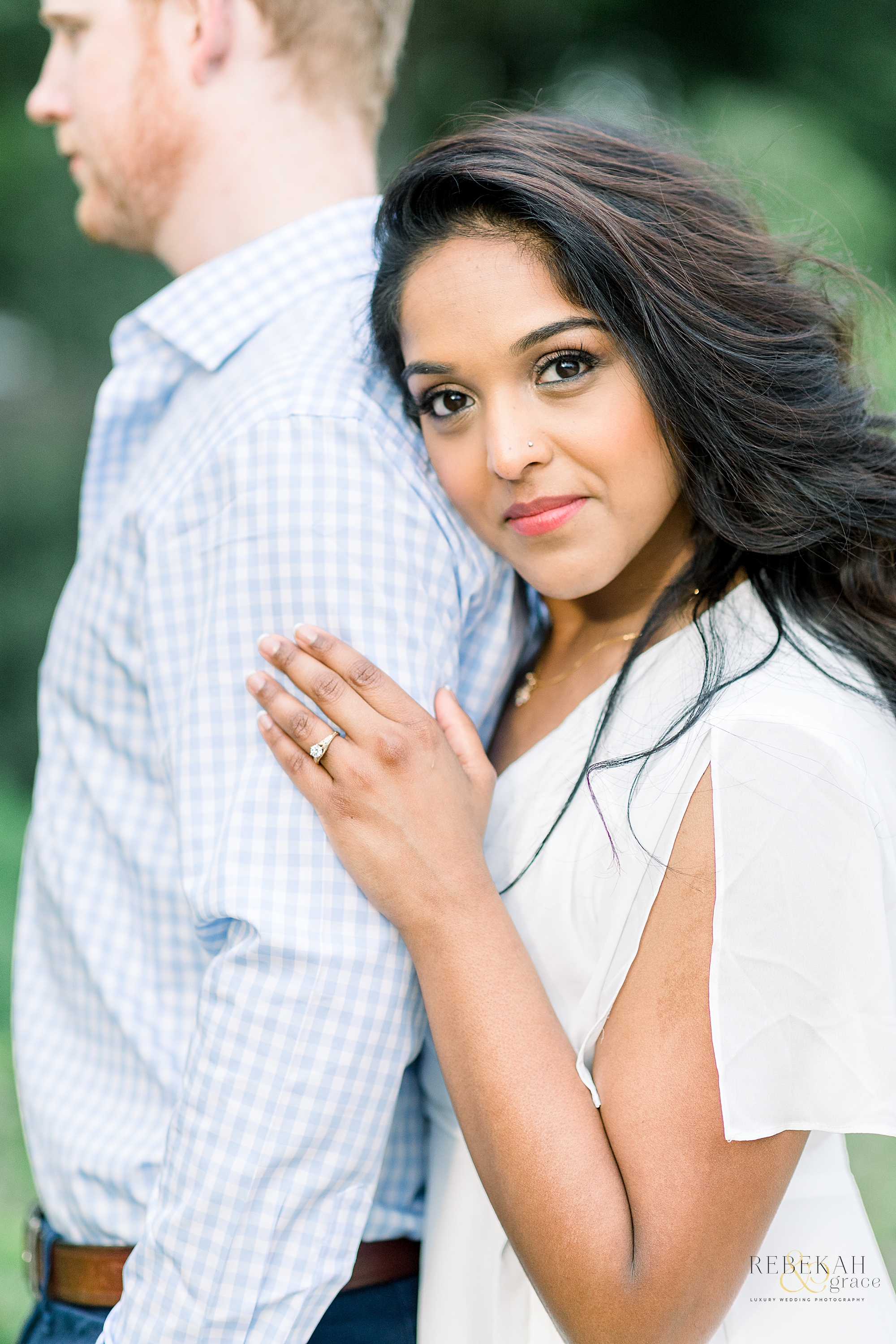 Custom gold engagement ring.  Raleigh engagement photography taken in JC Raulston Arboretum and Downtown Raleigh North Carolina by Rebekah & Grace Photography. 