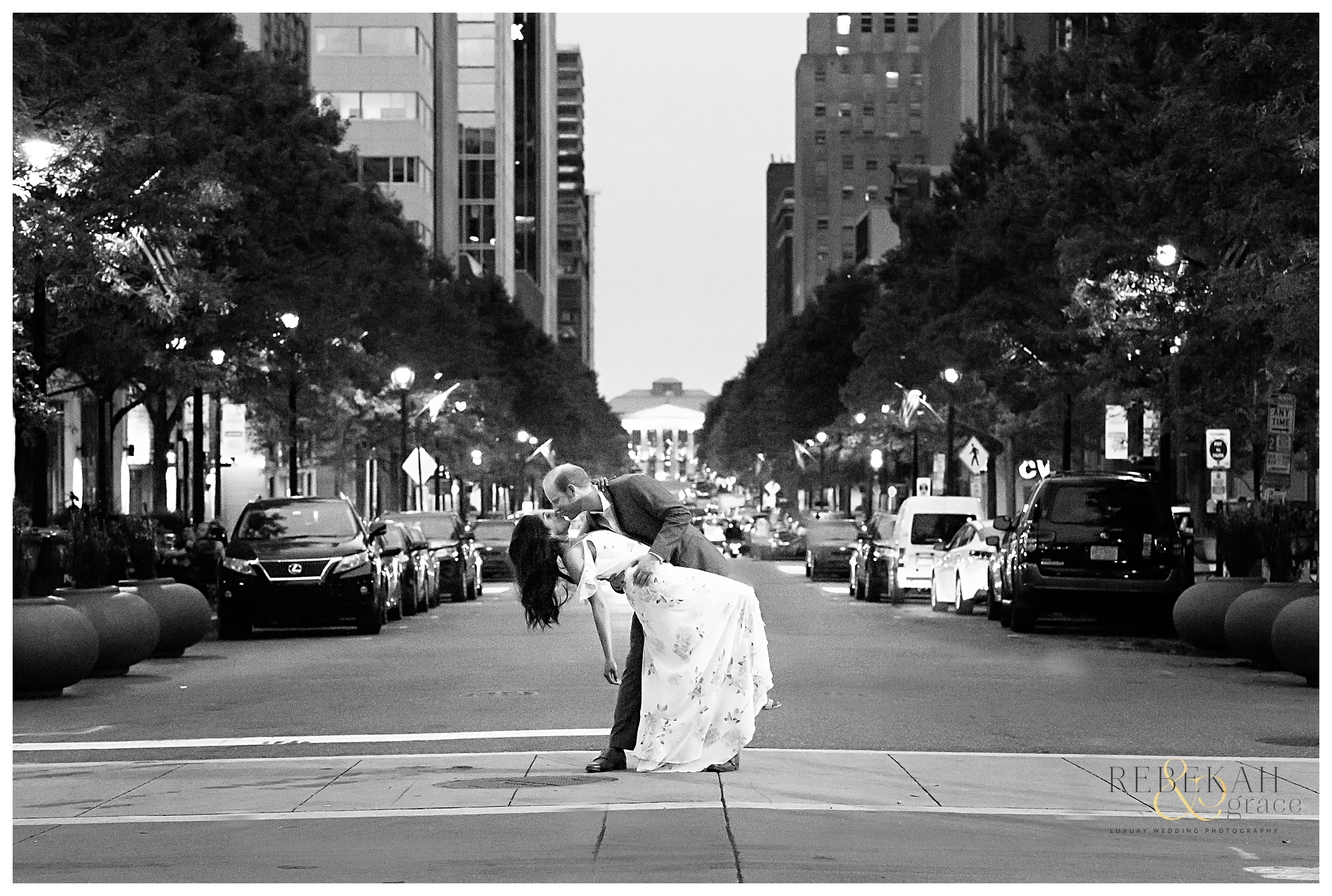 Engagement Photography | Night city lights in Downtown Raleigh, North Carolina. | Black and white photography | Photography by Rebekah & Grace Photography.